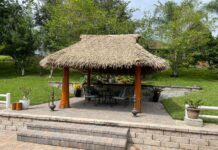 Synthetic Thatch for Coastal Properties: How It Performs Against Sun, Salt Air, and Humidity